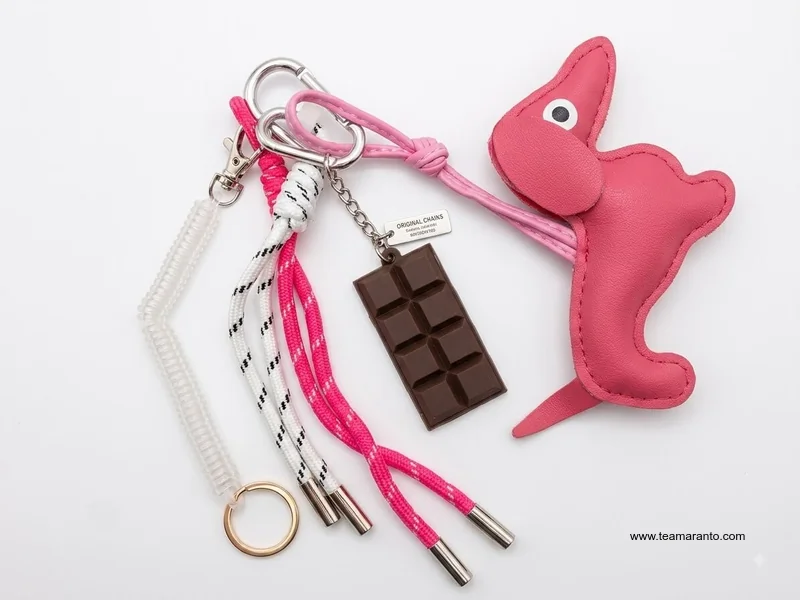 LLAVERO CHARM COLGANTE DE PERRO SALCHICHA PARA BOLSA UNIBELLA COLORES SURTIDOS